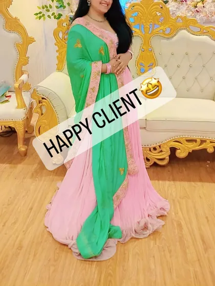 This client looks graceful in a pink and green anarkali-style gown. Your happiness is what drives my business.
