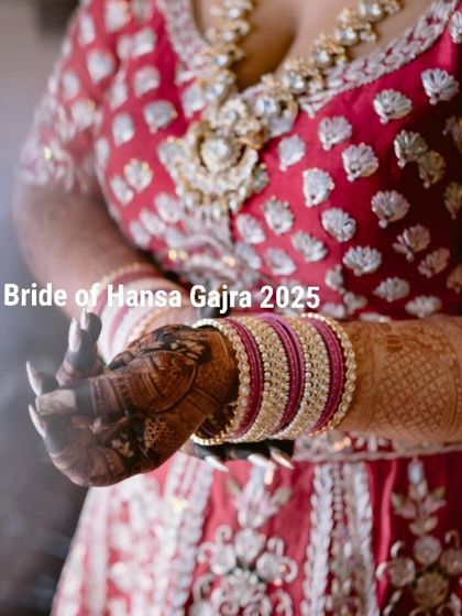 A close-up of the bride's hands, adorned with mehendi and traditional choora bangles. The smoky effect adds a dreamy and artistic touch to the photo.