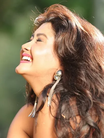 A candid shot of Kanchi Singh, capturing a moment of pure joy. Unposed, natural expressions often make the most compelling photographs.