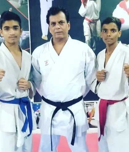Two of my dedicated students standing with Hanshi Bharat Sharma. Moments like these provide invaluable inspiration and connect our academy to a rich lineage of martial arts tradition.