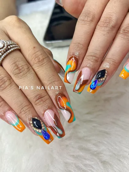 A custom design by our client, featuring a mix of abstract art and large, colorful jewels.
