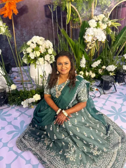 A full-length shot showing how gracefully she carries the entire ensemble. The makeup and hair complete her sophisticated look.