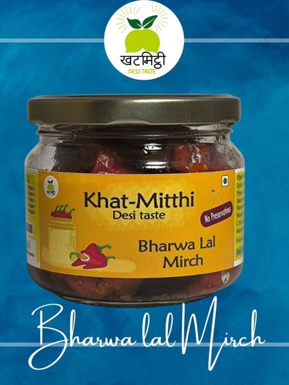 A jar of my Bharwa Lal Mirch pickle, ready to be sent to a new home. The deep red colour is all-natural, a sign of the quality chillies I use.