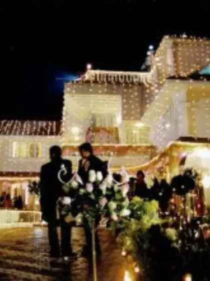 I also handle complete lighting decoration for houses and buildings. Here, I used strings of warm fairy lights to outline the architecture of the entire home, creating a grand and festive look for an evening celebration.