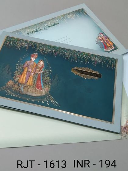 This invitation showcases a royal couple in a romantic pose against a deep teal, starry night background. The design is elegant and perfect for an evening reception announcement.