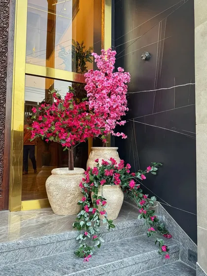 A close-up of the faux flower arrangement. I use high-quality materials to ensure the plants look realistic and beautiful from every angle.