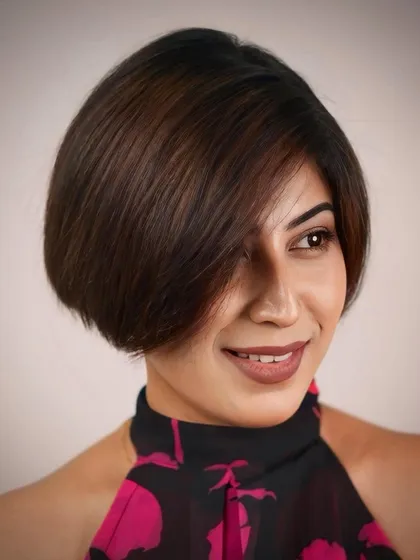 The classic bob is a testament to precision cutting. We shape each bob to complement the client's face shape and hair type, resulting in a timeless look that is both sophisticated and effortlessly chic.