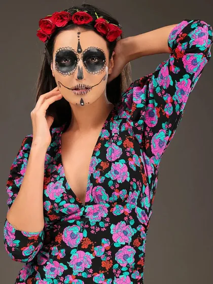 Another pose from the "Day of the Dead" Halloween shoot, showing off the floral dress and intricate face makeup.