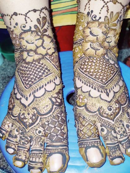 A close-up of a unique foot design that uses negative space and bold lines to create a modern yet traditional look.