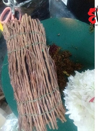 Prepping for a Christmas workshop with natural elements. These dried sticks will be used to create a rustic and festive structure for a holiday-themed floral arrangement.