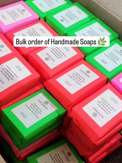The finished bulk order of handmade soaps, all labeled and ready to go. These were scented with essential oils like Orange & Cinnamon and Lemongrass & Eucalyptus.