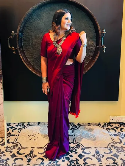 A dash of desi. This maroon saree with oxidized silver jewelry was for the "Me Crorepati 2.0" event, blending tradition with corporate elegance.