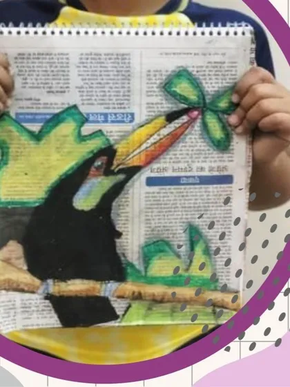 A creative twist on a drawing surface! This student used oil pastels to draw a toucan on a newspaper, learning how to make colors pop against a printed background.