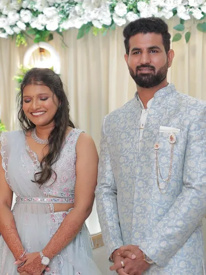 A joyful candid of the engagement couple. Her minimal makeup look with a touch of glam ensures she looks fresh and radiant throughout the long event.