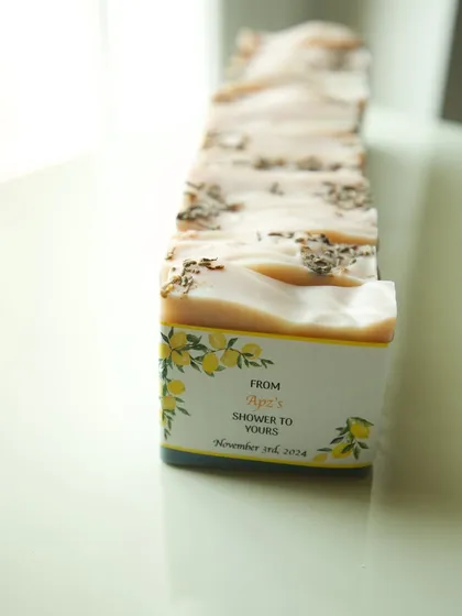 A single bar showing the beautiful custom wrap and the soap inside.