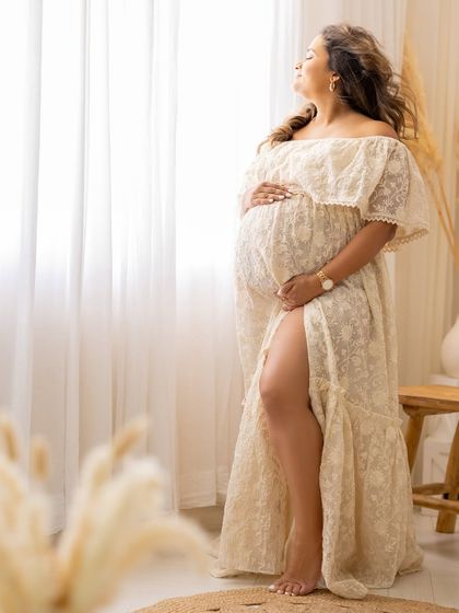 A duplicate of ID 78, this full-length shot shows the beautiful lace gown and the client's radiant pose.