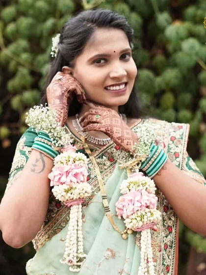 Floral kalire are not just for weddings. This mom-to-be chose to wear them for her baby shower, adding a unique and traditional element to her celebration.