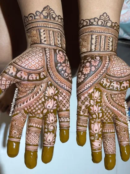 This intricate design with elephants and lotuses shows the amazing progress students make.