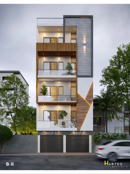 This proposed elevation for builder floors in West Delhi integrates commercial shops on the ground floor. The design uses a dynamic mix of wood textures, profile lighting, and glass railings to create a modern, multi-functional building.