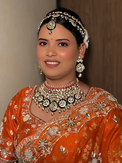 A happy portrait of our bride in orange. Her confidence is her most timeless accessory.