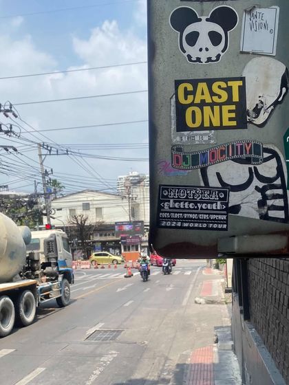 My sticker spotted on a street pole. My brand and music are part of the urban landscape, connected to street culture.