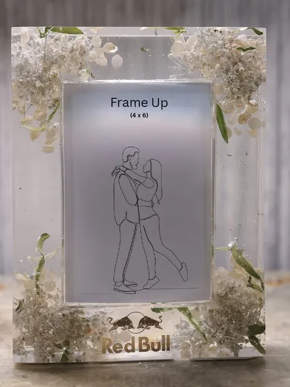 The custom floral resin frame I created for the Red Bull PR package, designed to hold a 4x6 photo.
