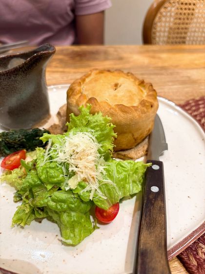 The savory chicken pot pie from La Croûte, a perfect example of their comforting and high quality fare. I make sure to capture both savory and sweet dishes to provide a balanced review of a restaurant's menu.