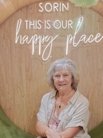 Another shot of a happy client enjoying the peaceful ambiance of our salon. Her relaxed posture says it all.