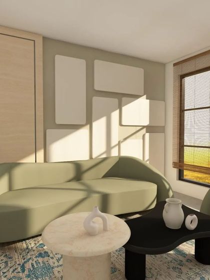 Another view of the contemporary living room design. The natural light streaming in from the large window highlights the soft green of the sofa and the textures of the rug.