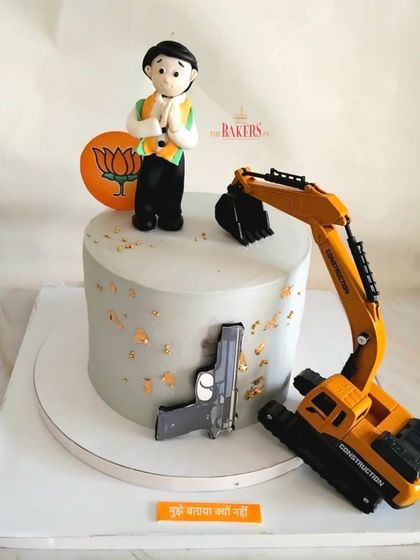 A unique cake for a BJP politician's birthday who also runs a construction and gun business. I love working on these quirky concepts and bringing a client's specific ideas to life.