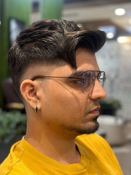 Another angle of the stylish men's fade, proving its sharp look from all sides.