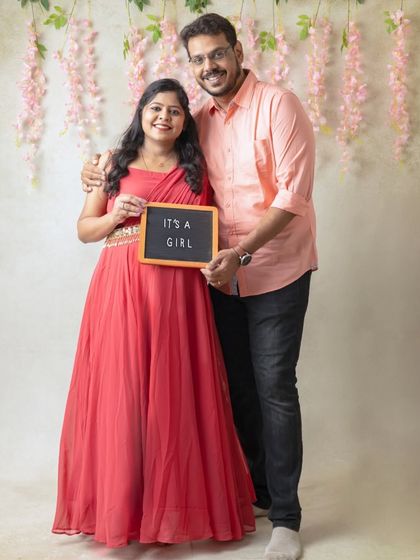 A happy announcement from the parents-to-be. Using a simple chalkboard prop is a sweet and personal way to share your exciting news during a maternity shoot.