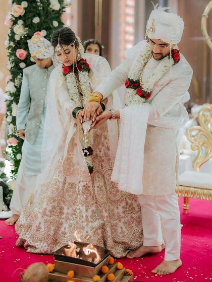 A beautiful moment from the wedding ceremony. The couple looks so happy and in love.