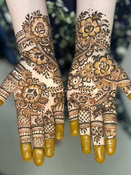 Intricate Full Hand Mehendi photo 6