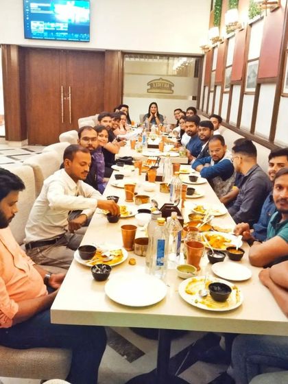 A dinner meeting with colleagues and associates. Building strong professional relationships is just as important as the legal work itself.