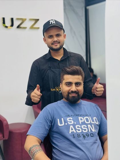 A happy client after his haircut and set. A sharp cut and good styling can make all the difference.