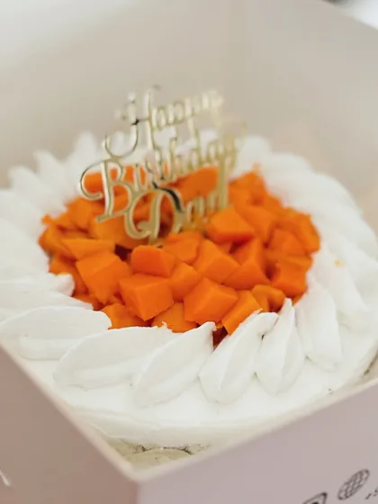 Summer's sweetness in a Classic Mango Cream cake. This one, for a special dad's birthday, is made with a wholewheat base and topped with fresh Alphonso mangoes.
