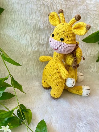 My bestseller giraffe doll is always a favorite. With its long neck, sweet smile, and spotted pattern, it's a cheerful and friendly companion for any child. This one is a larger size for extra big hugs.
