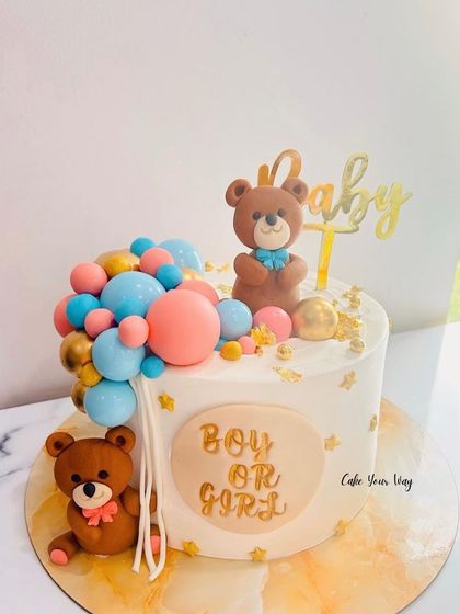 For every sprinkle, a wish for the baby to come. An adorable teddy bear gender reveal cake.