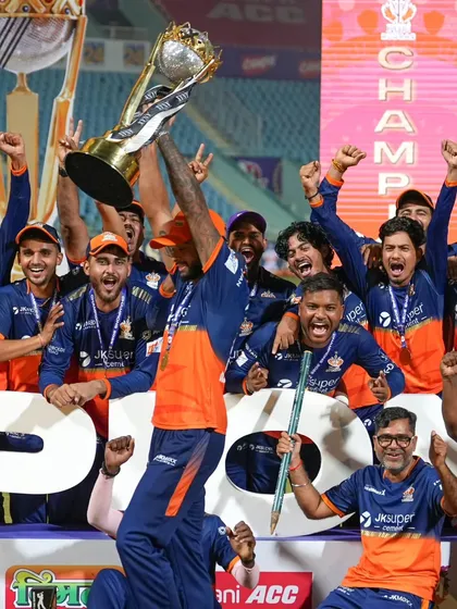 The moment of pure victory. Capturing the Kashi Rudras team lifting the UPT20 League trophy is about documenting the raw emotion and celebration that follows a hard-fought win. This is the ultimate payoff.