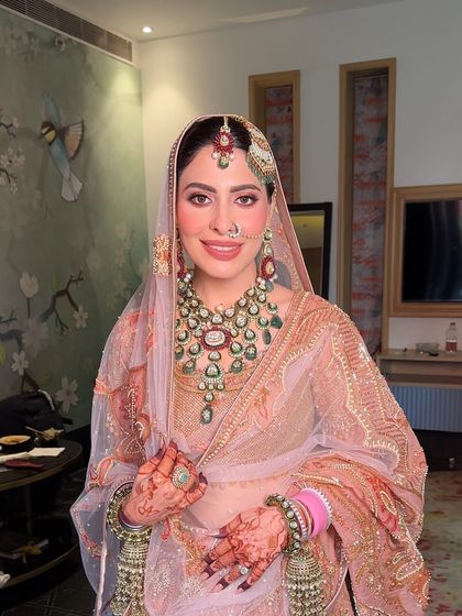The bride with her dupatta set, looking serene and beautiful before her Anand Karaj ceremony.