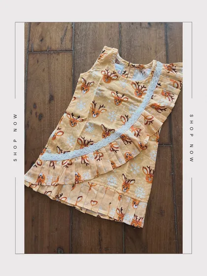 Embrace the charm of nature with our Small Deer Printed Dress. Adorned with pleat detailing and delicate white lace, it’s a cotton dream come true.
