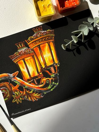 An intricate painting of a vintage-style lantern glowing in the dark. I used gouache on black paper to make the light feel warm and inviting.