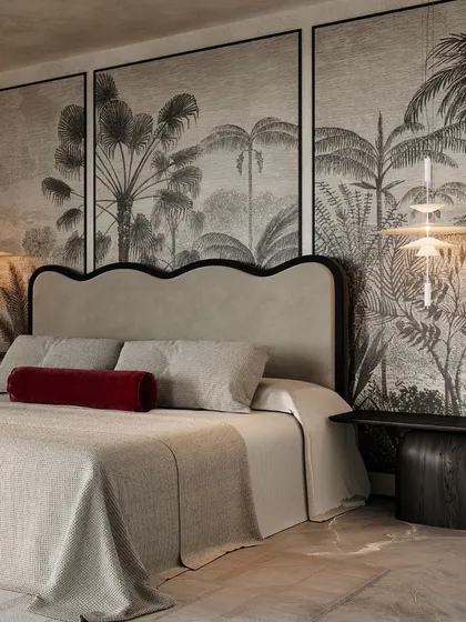 For this master bedroom, I designed a dramatic and moody retreat. The tropical-themed mural acts as a stunning art piece, creating an immersive backdrop that feels both relaxing and sophisticated, perfect for unwinding.