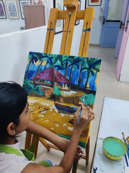 See how a student builds up a vibrant tropical beach scene, learning to paint palm trees, a hut, and the sandy shore.