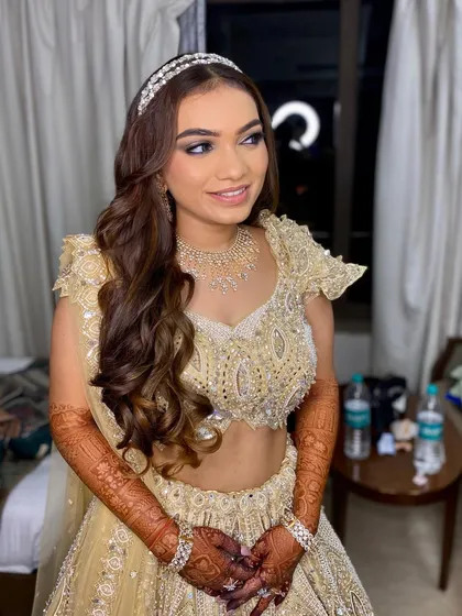 A beautiful smile from the happy bride-to-be. Khushbu's makeup is designed to make her feel confident and beautiful on her special night.
