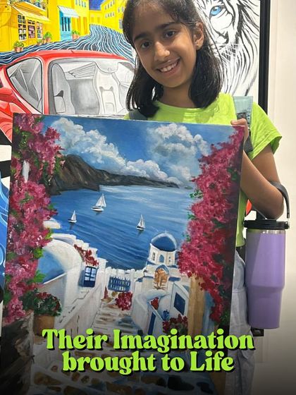 It is wonderful to see a child's imagination brought to life. This young student is thrilled with her beautiful landscape painting of a seaside village, which she created on a large canvas.