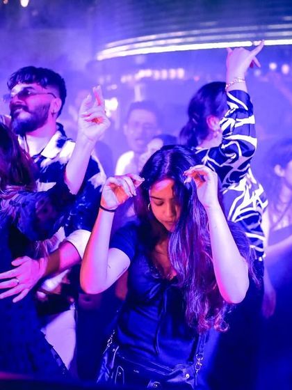 A group of friends lost in the music at Sarjapur Social. My goal is to create these moments where you can forget everything and just dance.