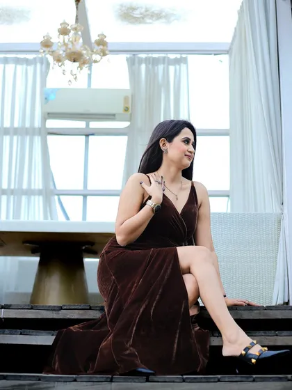 A more candid, thoughtful portrait from the same series. Including a mix of posed and unposed moments helps create a more authentic and relatable story for an influencer's audience.