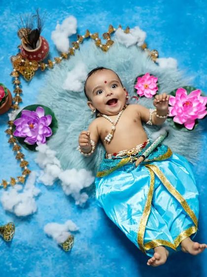 Our little Krishna enjoying the Janmashtami celebrations! This creative flat-lay style shoot is a unique way to capture the festive theme.